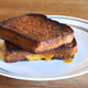 Illustration for article titled Slather grilled cheese exteriors with flavored mayo